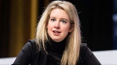 Will Elizabeth Holmes launch a coin by December 31?